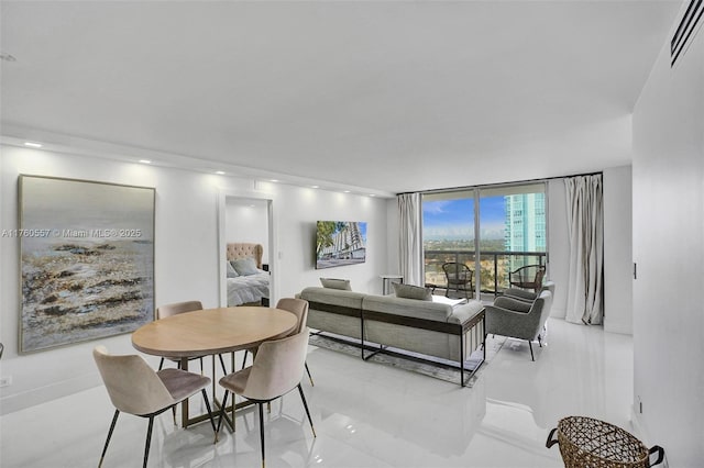 dining space with recessed lighting, visible vents, and floor to ceiling windows