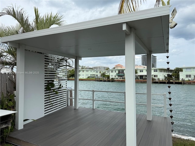 dock area with a water view