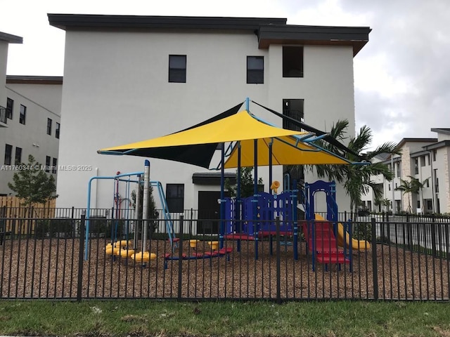 community jungle gym with fence