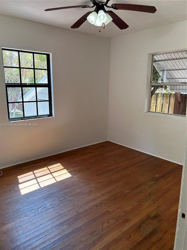 empty room featuring wood finished floors