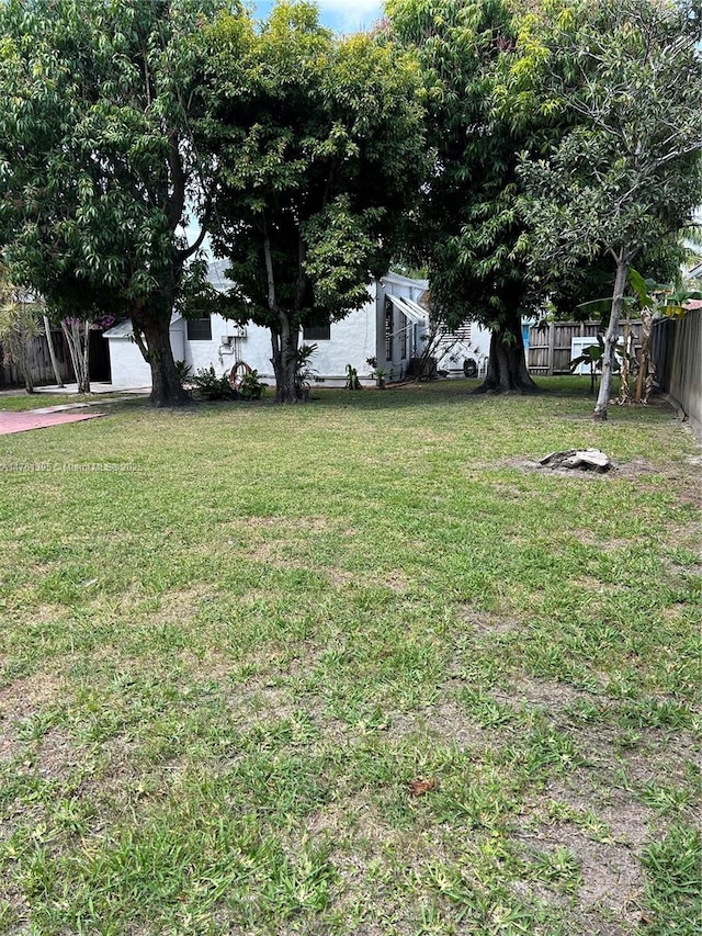 view of yard with fence