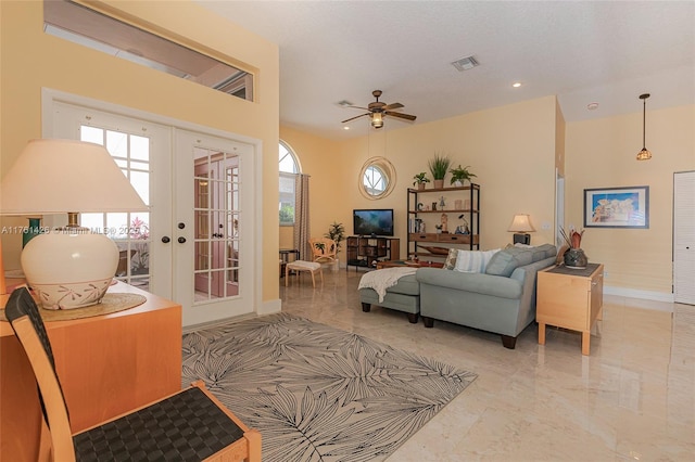 1154 SE 6th Ct, Dania Beach, FL 33004 - living room featuring french doors, visible vents, marble finish floor, and baseboards