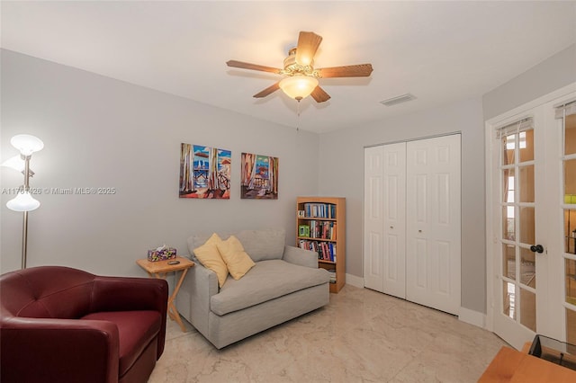 1154 SE 6th Ct, Dania Beach, FL 33004 - living area with visible vents, marble finish floor, french doors, and ceiling fan