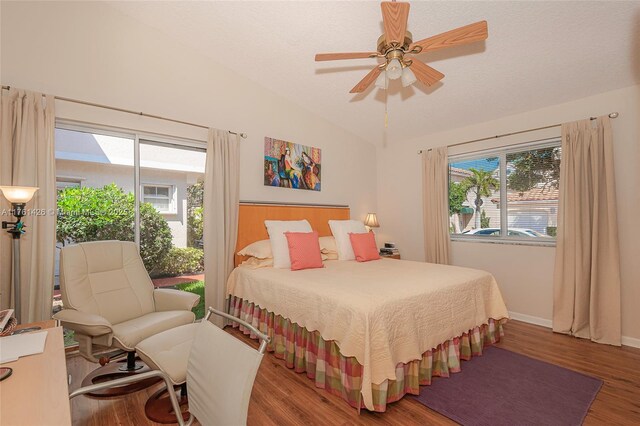1154 SE 6th Ct, Dania Beach, FL 33004 - bedroom featuring a ceiling fan, access to outside, wood finished floors, baseboards, and vaulted ceiling
