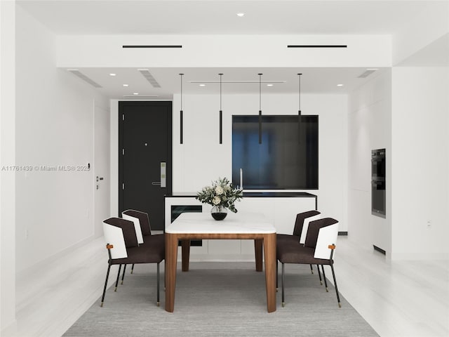 dining space with recessed lighting, visible vents, and baseboards