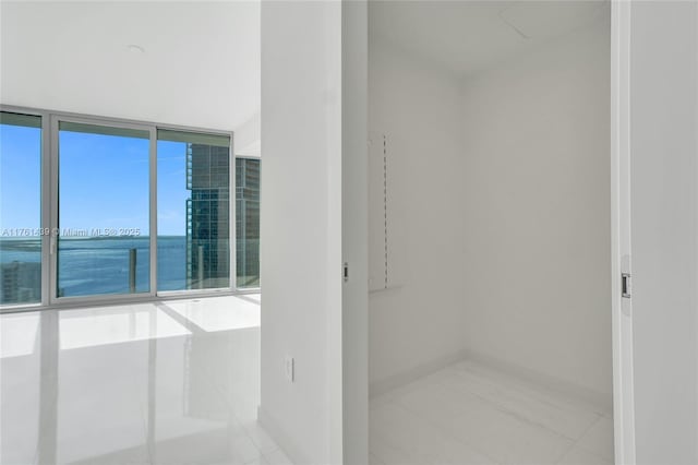 bathroom featuring a wall of windows