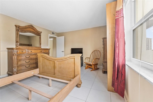 401 Golden Isles Dr Unit 516, Hallandale Beach, FL 33009 - bedroom featuring light tile patterned flooring