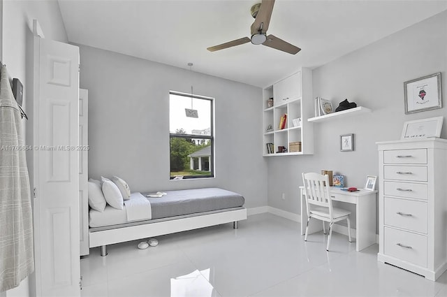 105 E 14th St, Lehigh Acres, FL 33972 - bedroom featuring baseboards and ceiling fan