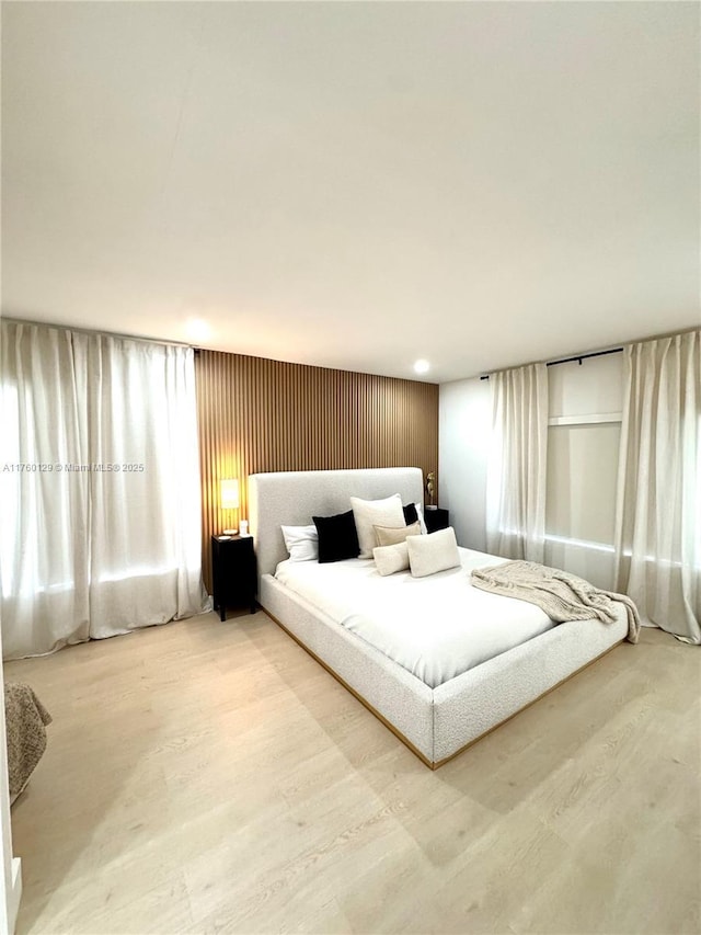 bedroom featuring wood finished floors