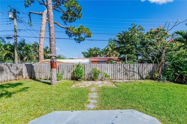 view of yard featuring a fenced backyard