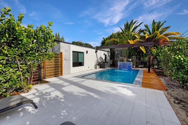 outdoor pool with a patio