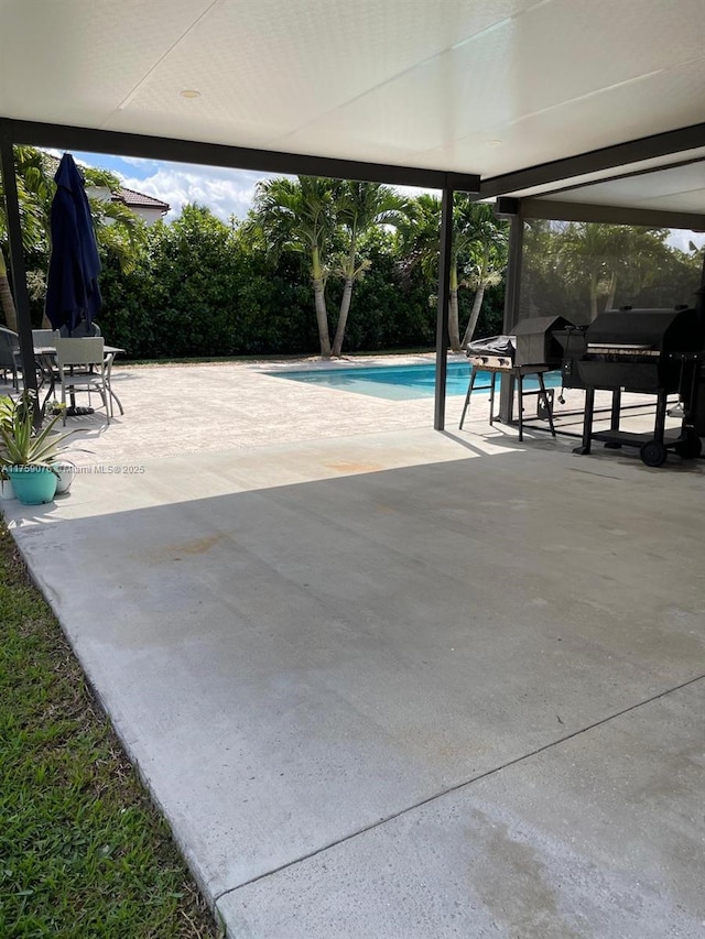 pool with a patio area