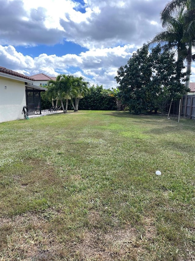 view of yard featuring fence