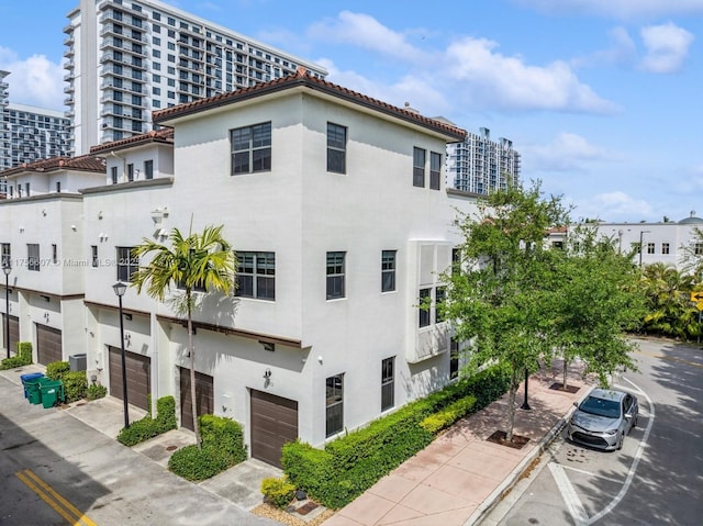 view of property featuring an attached garage