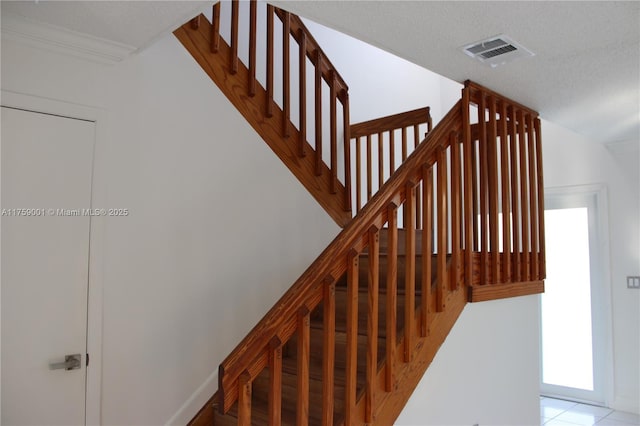 stairs featuring visible vents