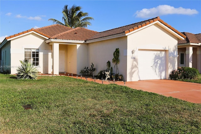 mediterranean / spanish-style house with a front lawn, concrete driveway, a garage, and stucco siding