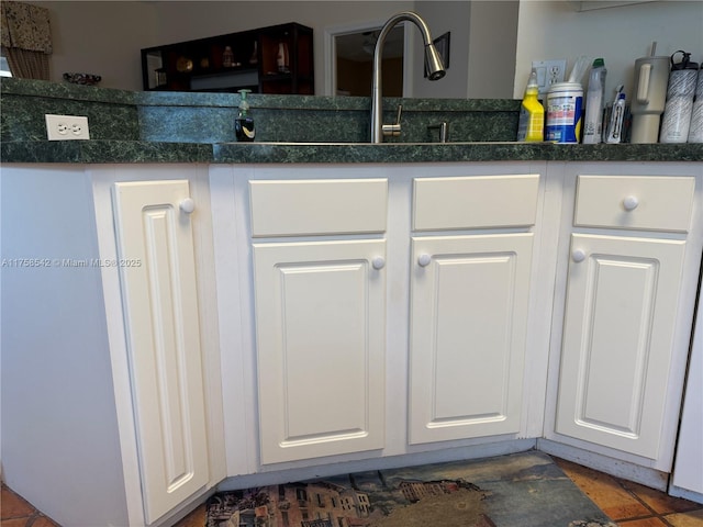 interior space featuring white cabinetry