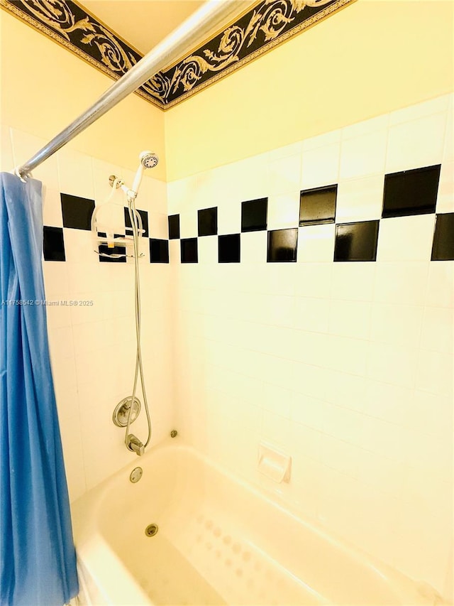 full bathroom featuring shower / bath combo