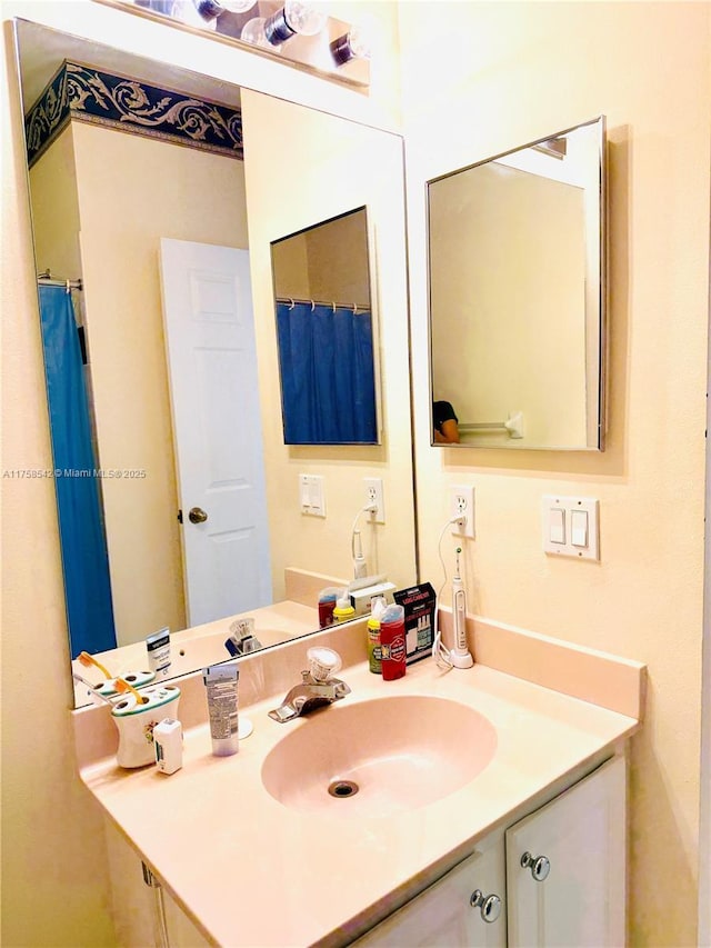 full bathroom featuring vanity