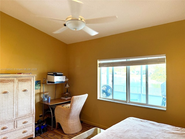 bedroom with ceiling fan and wood finished floors