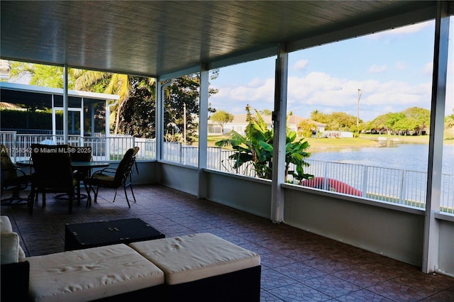 sunroom with a water view