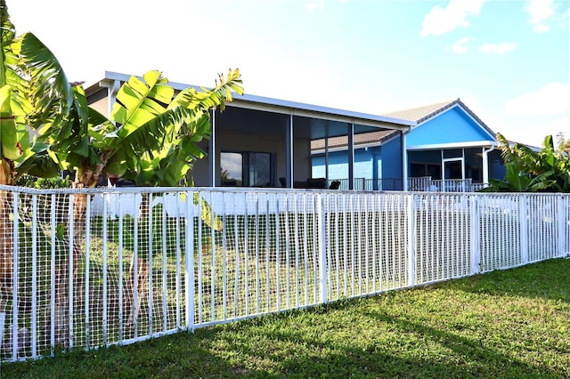 exterior space featuring a sunroom