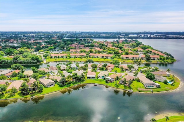 bird's eye view featuring a residential view and a water view