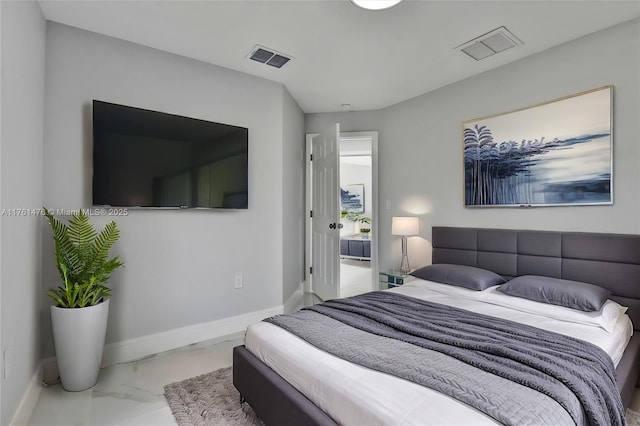 bedroom featuring visible vents, marble finish floor, and baseboards