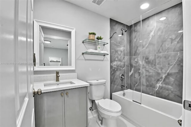 full bath with visible vents, toilet, shower / bath combination, and vanity