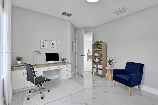 home office featuring visible vents, marble finish floor, and baseboards