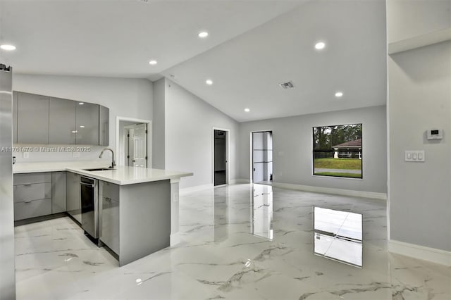 kitchen with gray cabinets, modern cabinets, marble finish floor, and a sink