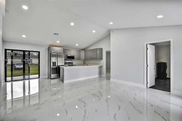 kitchen with visible vents, gray cabinets, appliances with stainless steel finishes, marble finish floor, and modern cabinets