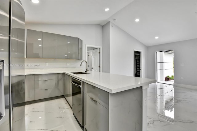 kitchen featuring modern cabinets, gray cabinets, marble finish floor, and a sink