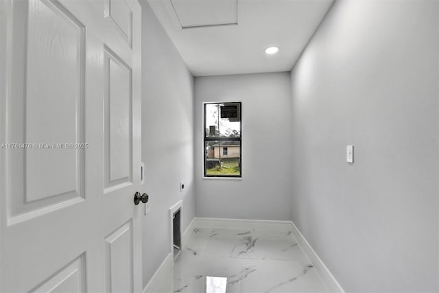 spare room with baseboards and marble finish floor