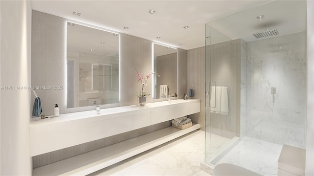 bathroom with a marble finish shower, visible vents, double vanity, marble finish floor, and a sink