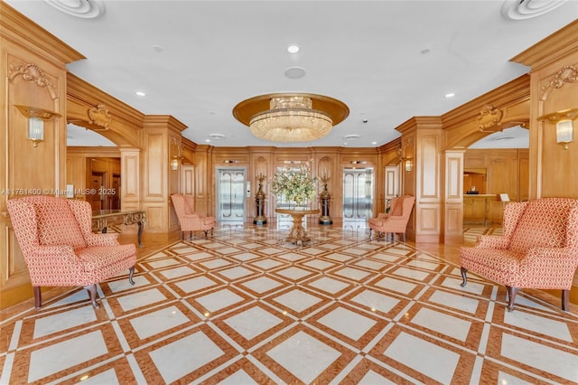 700 Biltmore Way Unit 1005, Coral Gables, FL 33134 - building lobby featuring a decorative wall and recessed lighting