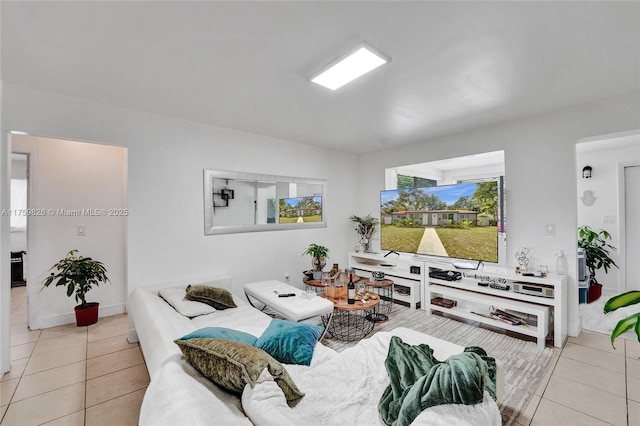 living area with light tile patterned floors