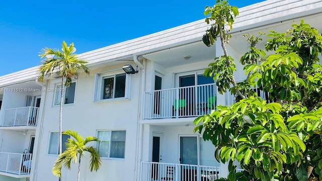 view of home's exterior with stucco siding