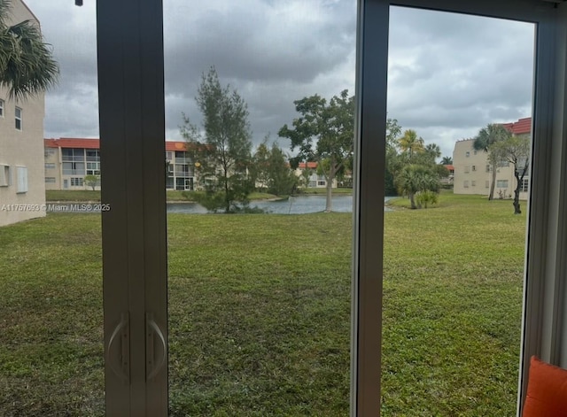 doorway featuring a water view