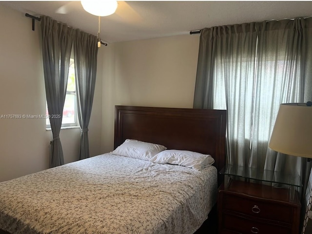 bedroom featuring ceiling fan