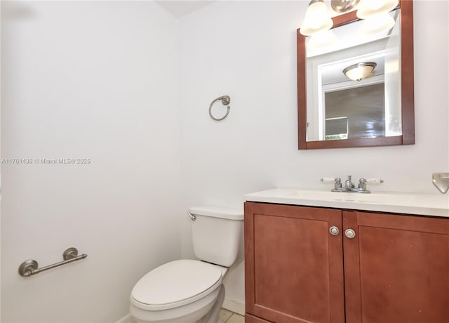 half bath with toilet and vanity