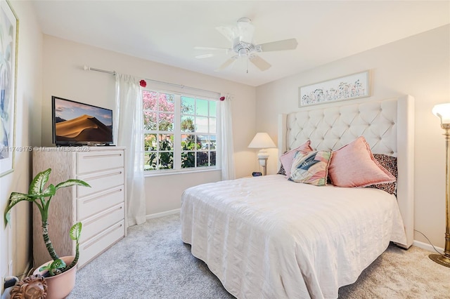 bedroom with baseboards, carpet, and a ceiling fan