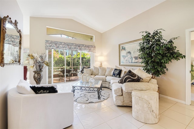 living room featuring baseboards, tile patterned flooring, and vaulted ceiling