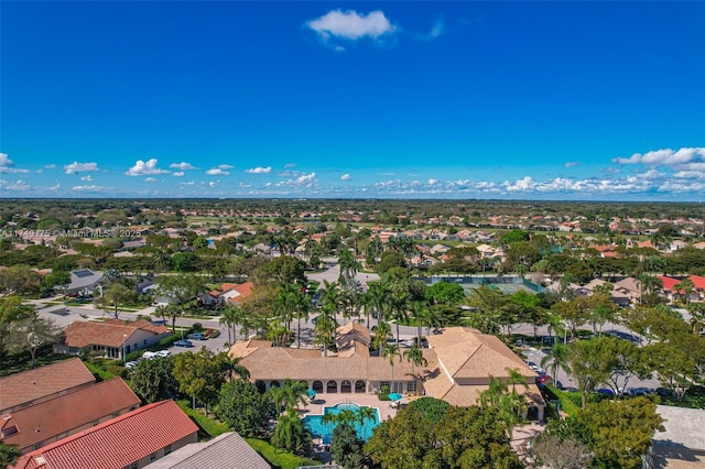 birds eye view of property with a residential view