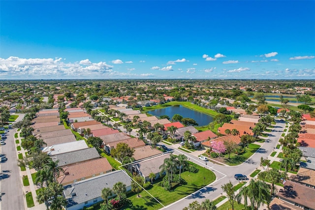 aerial view featuring a residential view and a water view