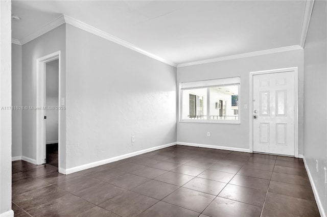 521 NE 82nd Ter, Miami, FL 33138 - entrance foyer with baseboards, dark tile patterned floors, and crown molding