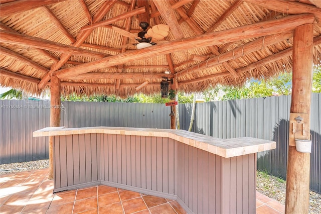 view of patio featuring a gazebo and a fenced backyard