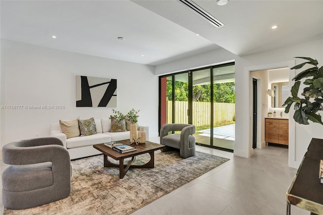 living area with recessed lighting