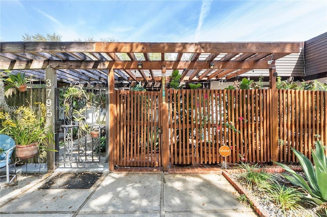 view of gate with a pergola