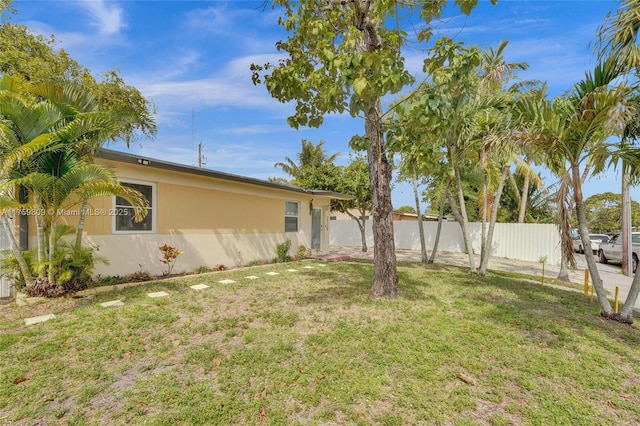 view of yard featuring fence